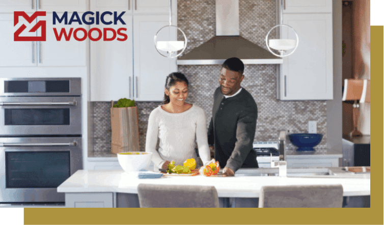 Couple cooking in a modern kitchen with Magick Woods cabinetry